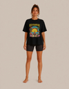 Model wearing the Meditation Zen Beach tee by Mojo Circus, front view