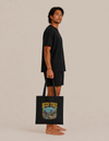 Model carrying the Koh Tao cotton tote bag by Mojo Circus