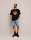 Model wearing the Same Same 2.0 tee by Mojo Circus, front view