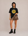Model wearing the Same Same tee by Mojo Circus, front view